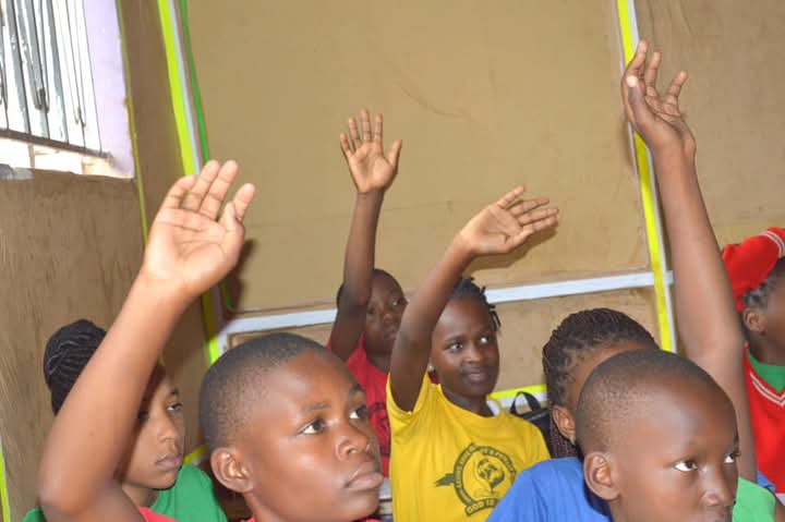 Saving Arms students in classroom